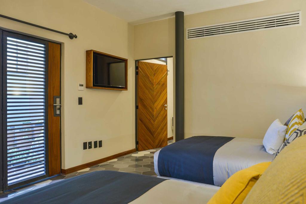 Hotel Criol Queretaro Exterior photo A room at the hotel